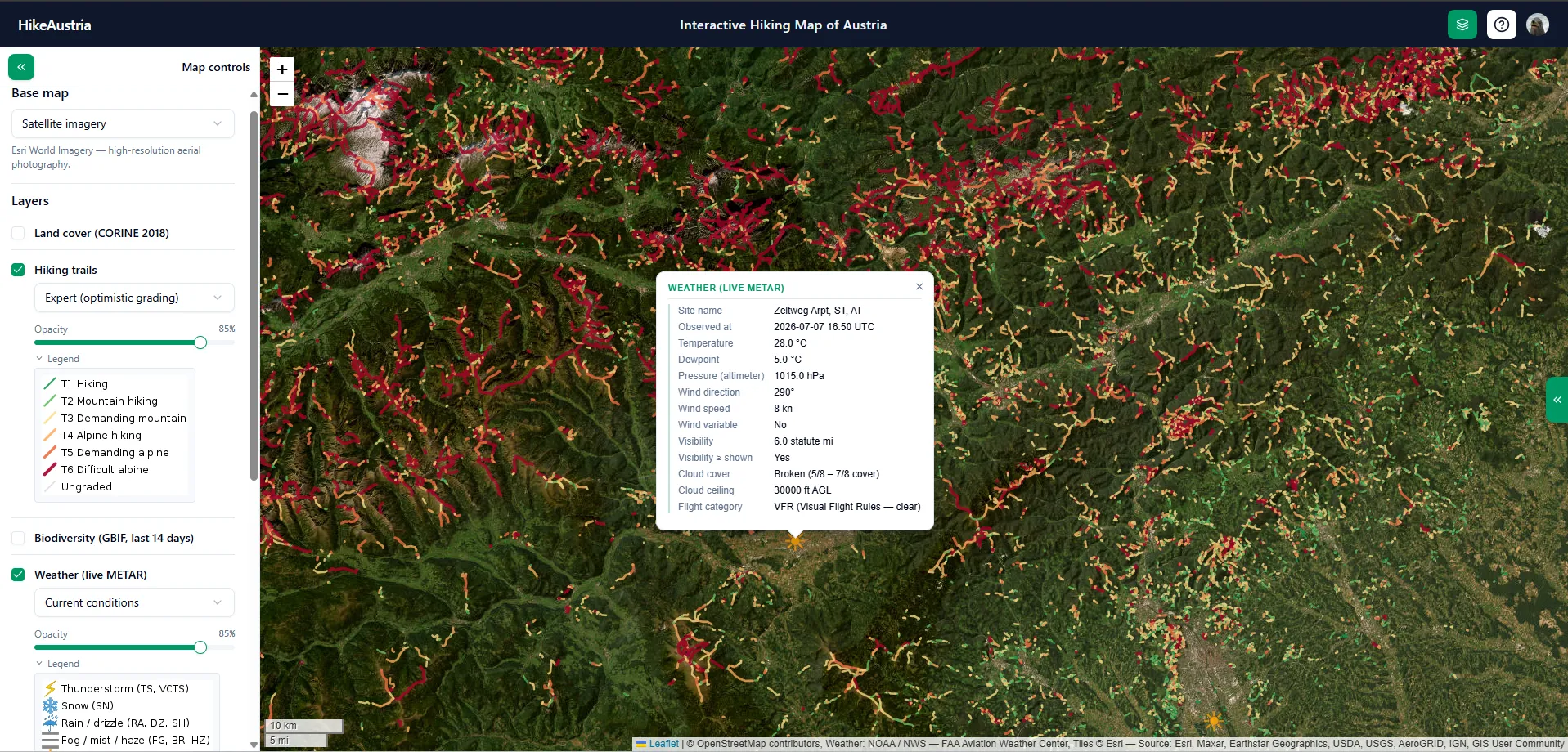Trails in front of satellite imagery, with a popup showing computed metrics such as gradient and ascent of one selected trail.